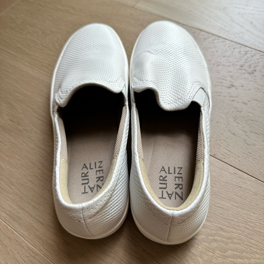 New, never worn white leather loafers